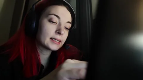 Female customer support agent is engaged in remote assistance during client Stock Footage 343951971