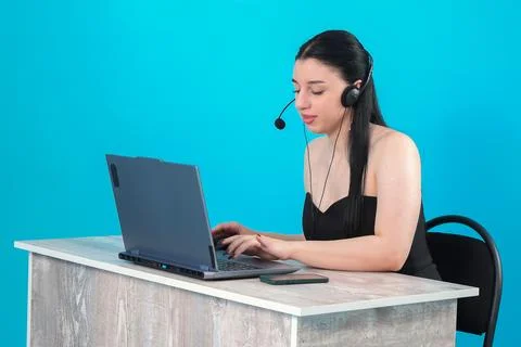 Female Customer Support Agent Working on Laptop Stock Photos