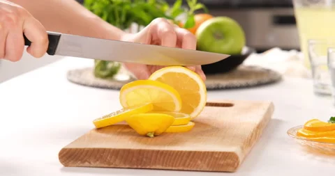 Female cutting lemon. Stock Footage 132980055