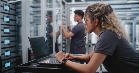 Female Cybersecurity Engineer Analyzing Critical Cyber Attack Warning in Data Stock Footage 344977283