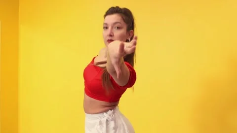 Female dancer learns sensual salsa from a professional teacher in a dance class Stock Footage 336547641