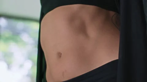 Female dancer makes body movement while practicing modern choreography in studio Stock Footage 244984567