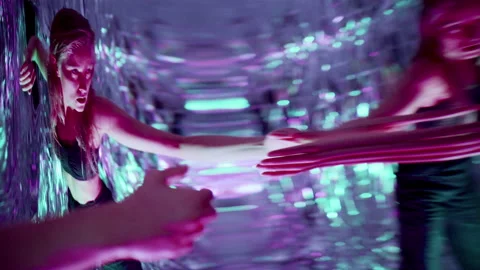 Female Dancer Moving among Distorted Reflections in Neon Lit Studio Stock Footage 306982851