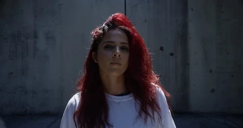 Female dancer performing her routine under an overpass Stock Footage 97238167