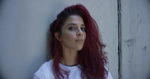 Female dancer posing against a wall Stock Footage 97244170