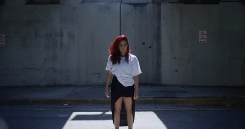 Female dancer posing while looking at the camera Stock Footage 97032439