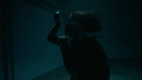 Female Dancer Turning on Portable Speaker in Industrial Studio Stock Footage 335689385
