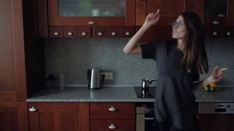 Female dancing in the kitchen at Breakfast Video stock 82834662