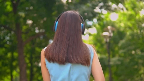 Female dancing outdoors slow motion Stock Footage 127844765