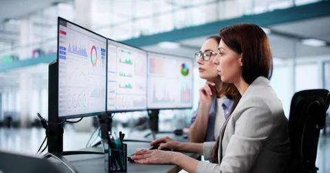 Female Data Analyst Analyzing KPIs Stock Photos