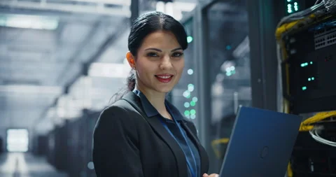 Female Data Center Engineer Using Laptop Computer Stock Footage 320867225