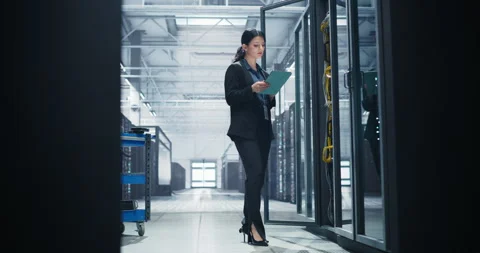 Female Data Center Specialist Using Tablet Computer Stock Footage 320866280