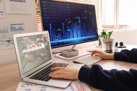 Female data scientist's hands working at desk in office Stock Photos