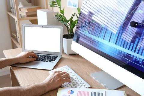 Female data scientist's hands working at desk in office Stock Photos
