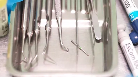 Female dentist checking up patient teeth Video stock 137401795