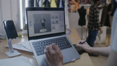 Female designer develops 3D design of clothes 스톡 동영상 229733782
