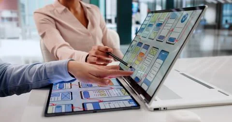 Female Designer Using Computer For UX UI Development In Airplane. Stock Photos