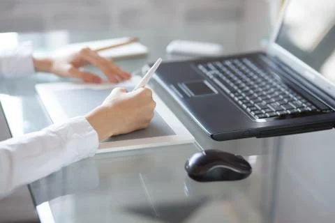 Female designer using graphics pad Stock Photos