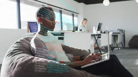Female dev typing on laptop, keystrokes causing code overlay on torso, aiding Stock Footage 334694002
