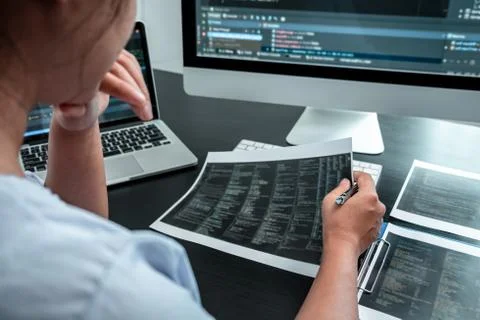 Female Developer programmer working on coding program software computer, Writ Stock Photos