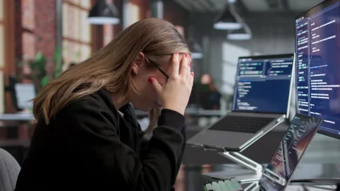 Female Developer Stressed While Coding Stock Footage 338170428