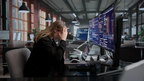 Female Developer Stressed While Coding Stock Footage 339894363