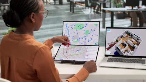 Female Developer Studies Urban Land Plans Stock Footage 337645455