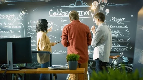 Female Developer with Tablet Computer Talks With Programer and Project Manager Stock Footage 82860228