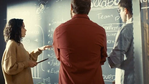 Female Developer with Tablet Computer Talks With Programer and Project Manager. Stock Footage 82888584