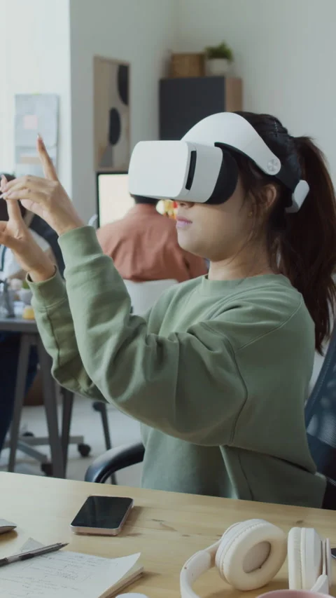 Female Developer Testing New Mobile App in Augmented Reality Headset Stock Footage 293930703
