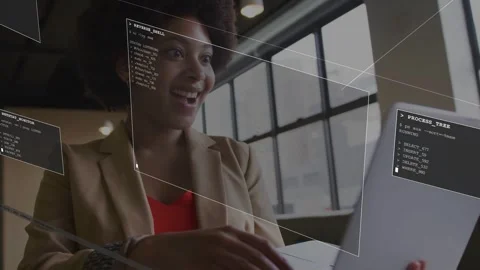 Female developer typing by large grid windows and activating PROCESS_TREE UI Stock Footage 333720290