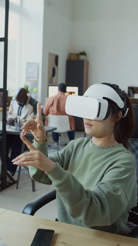 Female Developer in VR Helmet Working with Project in Augmented Reality Stock Footage 293167616