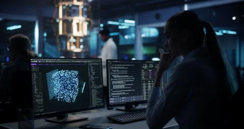 Female Developer Working on AI Model on Computer Stock Footage 318965426