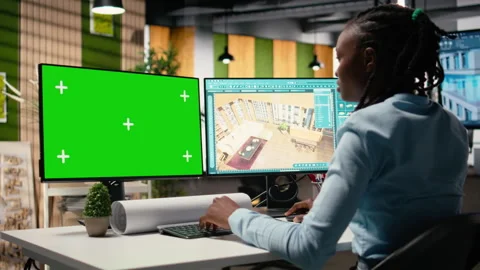 Female developer works on floor plan design with a chroma key screen Video stock 316794824