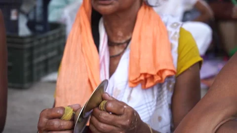 Female devotee playing bell outside Kamakhya Temple Guwahati4k file 175 Stock Footage 339269405