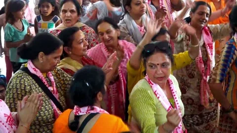 Female Devotee's dancing with Radha and Krishna in Maharaas Stock Footage 131708942