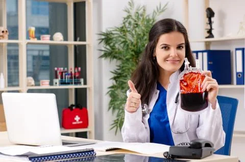 Female doctor in blood transfusion concept Stock Photos