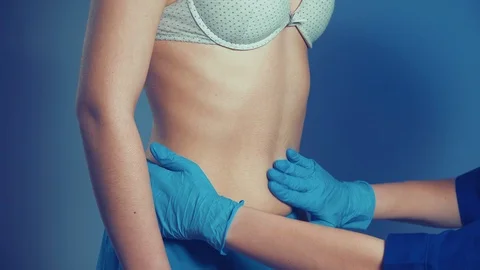 Female doctor examines a patient Stock Footage