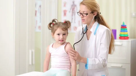 Female Doctor Examining Child With Stethoscope. Stock Footage