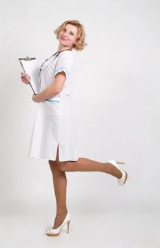 A female doctor with a folder Stock Photos