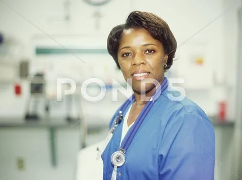 Female doctor in hospital room Stock Photos