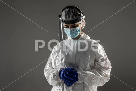 Female doctor in PPE personal protective equipment, wearing safety ...