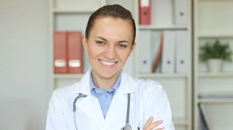 Female doctor smiling to camera Stock Footage