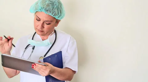 Female doctor using digital tablet Stock Footage 37110289