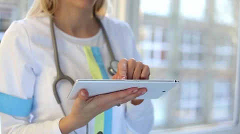 Female doctor using tablet computer Stock Footage 45856874