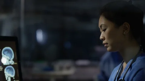 Female doctor working on computer in Brain Research Laboratory Stock Footage 106743047