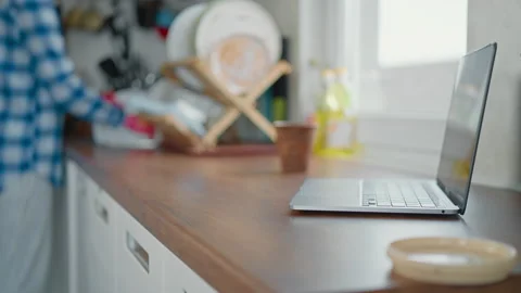 Female doing the dishes Stock Footage 221605759