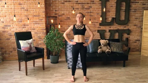 Female doing stretching workout Stock Footage 77022743