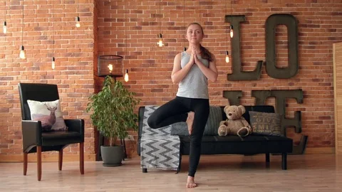 Female doing stretching workout Stock Footage 77024289