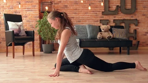 Female doing stretching workout Stock Footage 77031184
